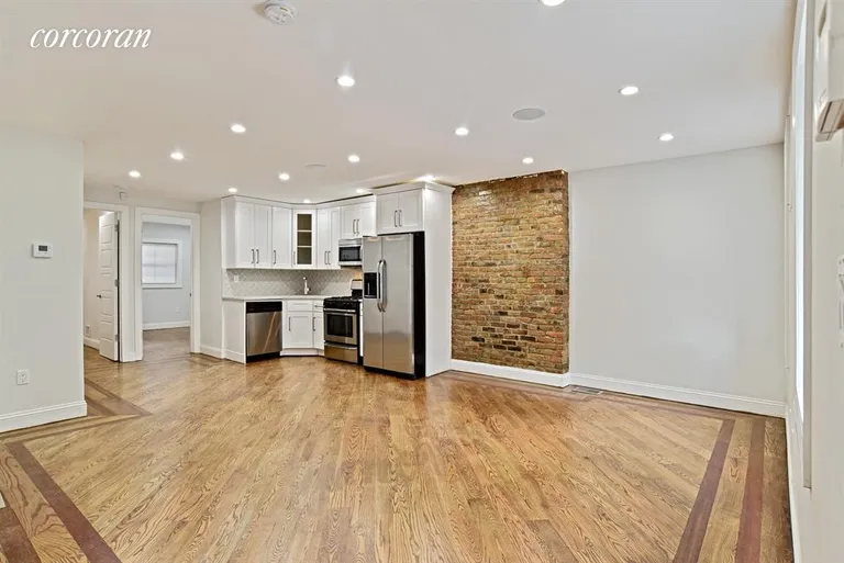 New York City Real Estate | View 111 Malcolm X Boulevard, 2 | Kitchen / Living Room | View 2