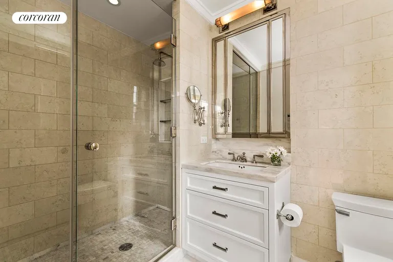 New York City Real Estate | View 845 West End Avenue, 9C | Calacatta Gold Carrara marble master bathroom | View 8