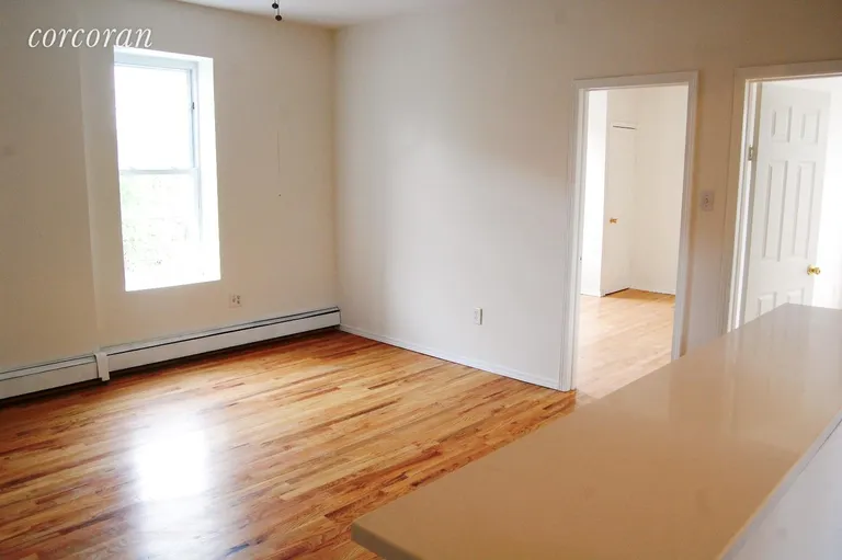 New York City Real Estate | View 342 Lewis Avenue, 3 | Bright Living Room with Open Kitchen | View 4