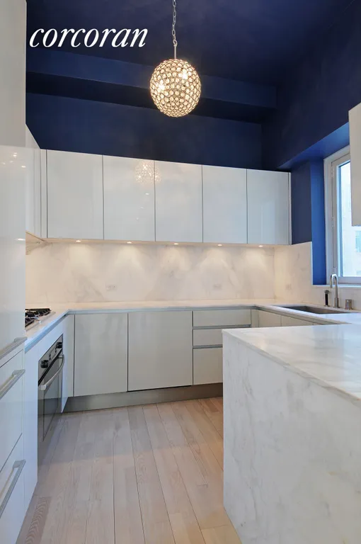 New York City Real Estate | View 322 West 57th Street, 15D | Open Kitchen | View 3
