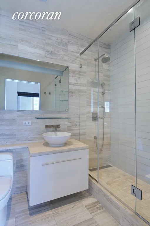 New York City Real Estate | View 322 West 57th Street, 15D | En Suite Master Bathroom | View 6