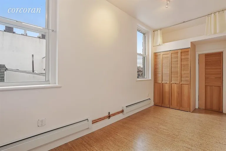 New York City Real Estate | View 71 East 3rd Street, 23/24 | Master Bedroom | View 4