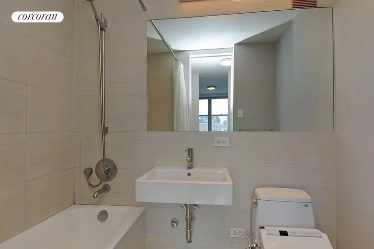 New York City Real Estate | View 333 East 14th Street, 10G | Fully renovated bathroom | View 5