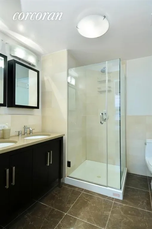 New York City Real Estate | View 301 West 118th Street, 8F | Master Bathroom | View 4