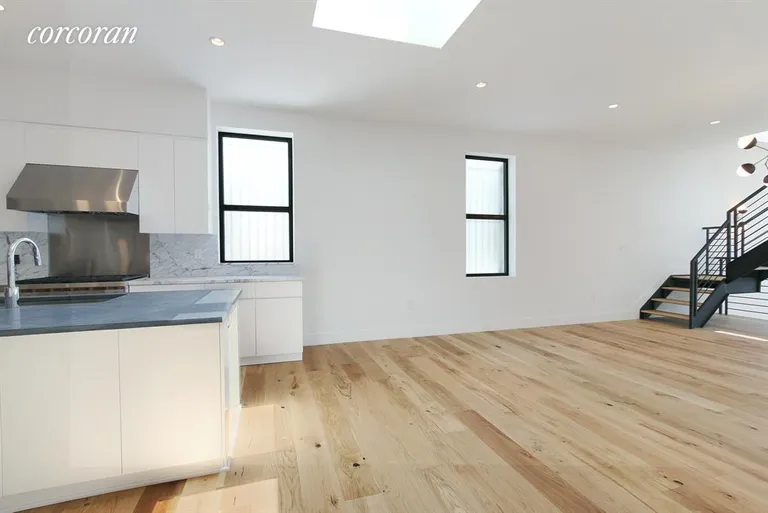New York City Real Estate | View 226 Pacific Street | Dining area with stairs to roof terrace | View 8