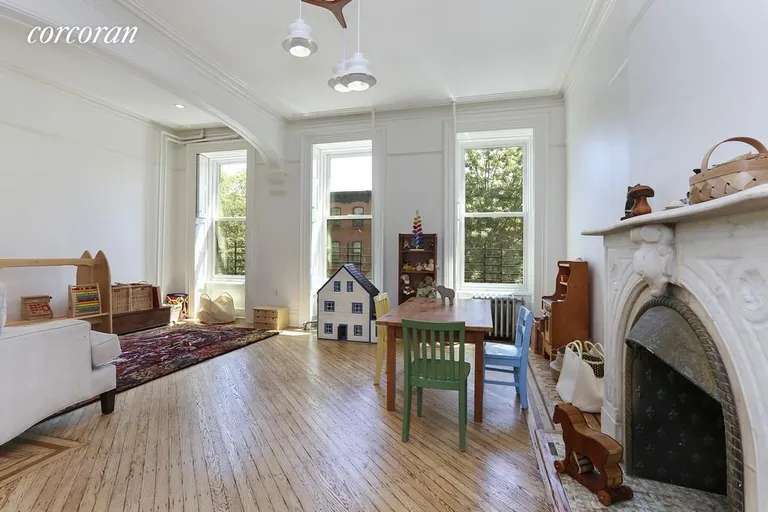 New York City Real Estate | View 112 Saint James Place, 2 | Playroom or grand, full width bedroom | View 8