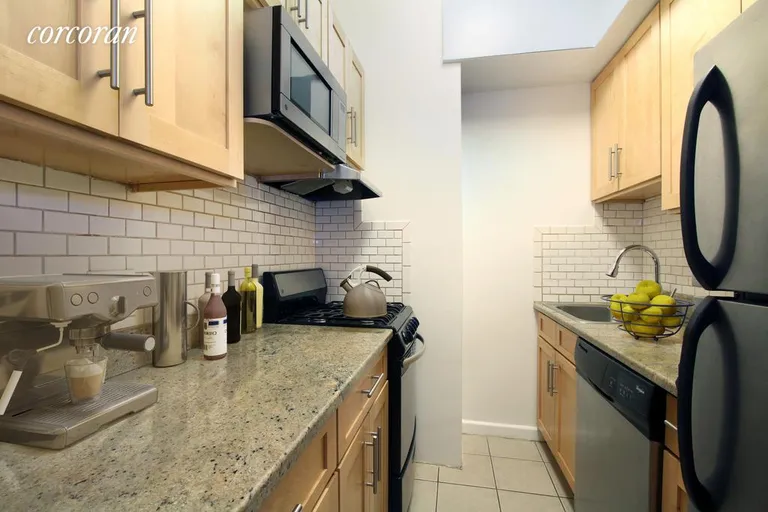 New York City Real Estate | View 50 East 86th Street, 4B | Kitchen With DISHWASHER & Full Size Appliances | View 3