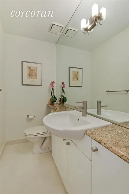New York City Real Estate | View 11 East 22nd Street, 7TH FL | Powder Room off central hallway | View 8