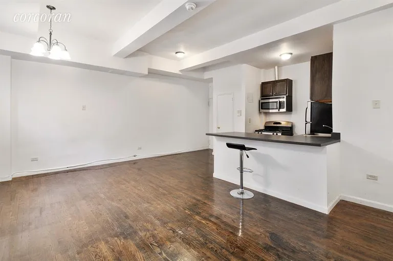 New York City Real Estate | View 45 Grace Court, C | Kitchen / Living Room | View 2