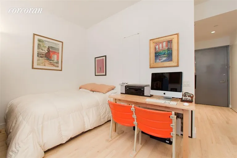 New York City Real Estate | View 210 Lafayette Street, 4E | Sleeping area in studio | View 3