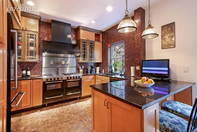 New York City Real Estate | View 326 West 19th Street | Professional stove & gourmet kitchen | View 5