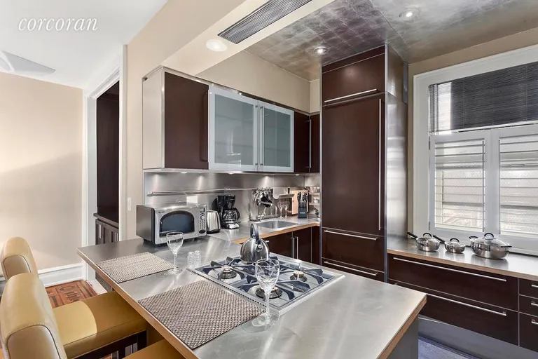 New York City Real Estate | View 205 West 57th Street, 9 D-C | Balthaup Kitchen with Stainless Countertops | View 2