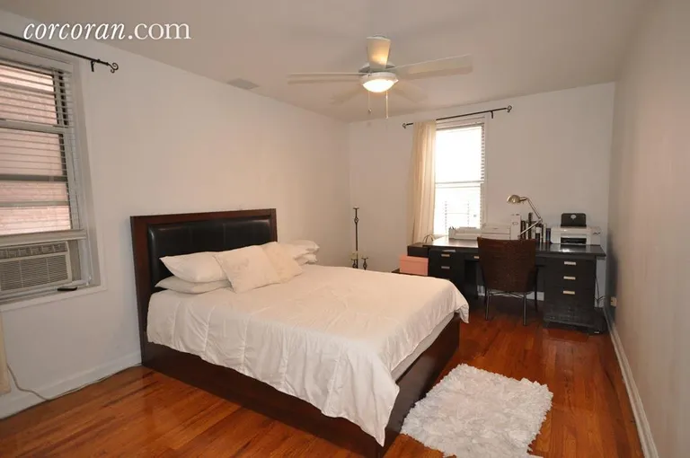 New York City Real Estate | View 2102 Holland Avenue, 1A | King sized Bedroom with 2 Windows | View 3