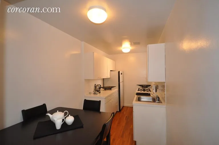 New York City Real Estate | View 2102 Holland Avenue, 1A | Eat-In Kitchen with Dishwasher | View 6