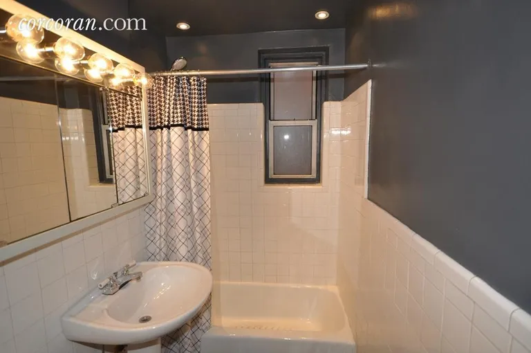 New York City Real Estate | View 2102 Holland Avenue, 1A | Tiled Bath, Marble Custom Recessed  Lighting  | View 8
