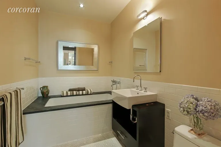 New York City Real Estate | View 110 Livingston Street, 8R | Lavish Bathroom with soaking tub and stall shower | View 5