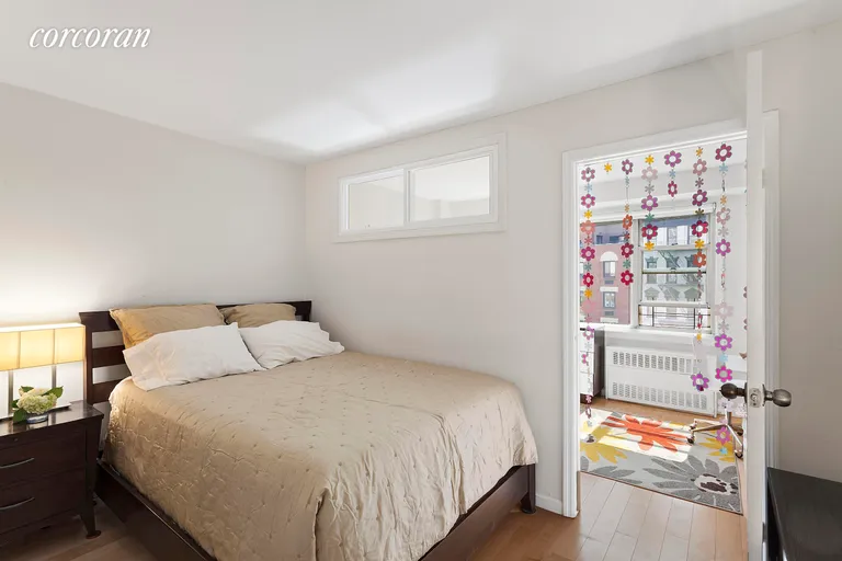 New York City Real Estate | View 2 Charlton Street, 7K | Bedroom with temporary wall creating 2 spaces. | View 4