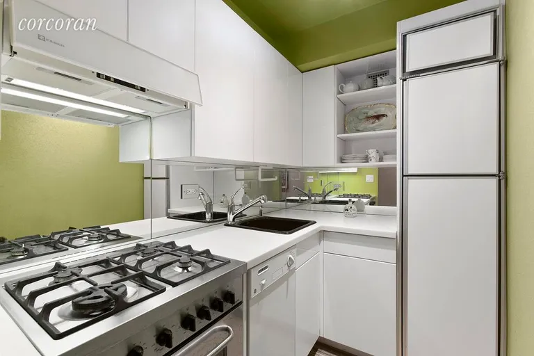 New York City Real Estate | View 11 East 87th Street, 3A | Sleekly Designed Kitchen | View 2