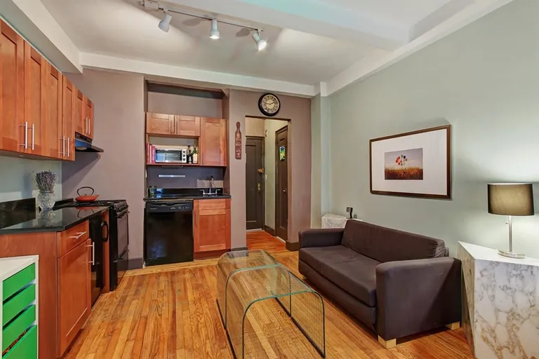 New York City Real Estate | View 11 Waverly Place, 2B | Living Room | View 2