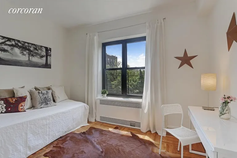 New York City Real Estate | View 283 East 5th Street, 3A | Corner Bedroom with Skyline Views | View 4