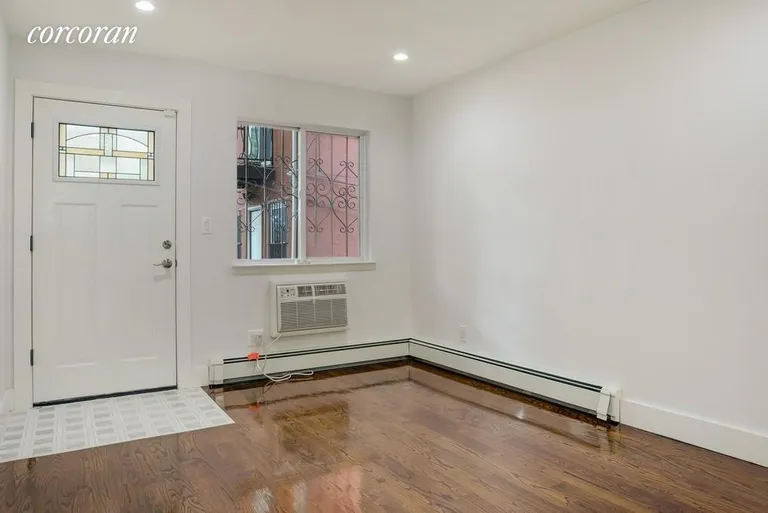 New York City Real Estate | View 704A Evergreen Avenue | Master Bedroom with Garden access | View 2