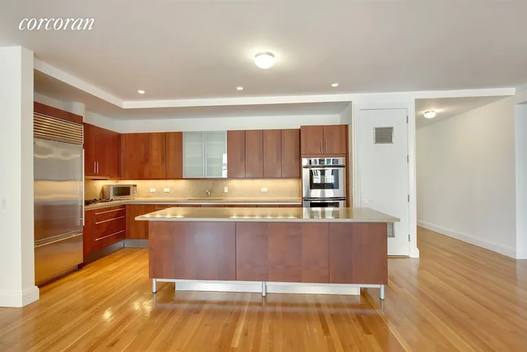 New York City Real Estate | View 124 Hudson Street, 6B | Open Kitchen with center island | View 2