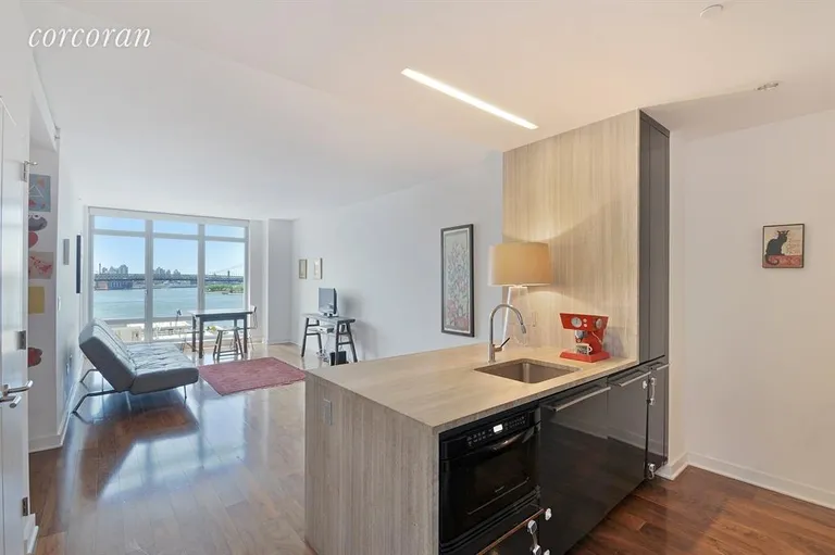 New York City Real Estate | View 2 Northside Piers, 15C | Spacious living room with breathtaking views | View 2