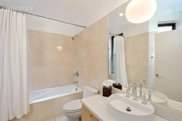 New York City Real Estate | View 363 7th Street, 3L | Updated Bathroom with Two Windows & Ample Storage | View 6