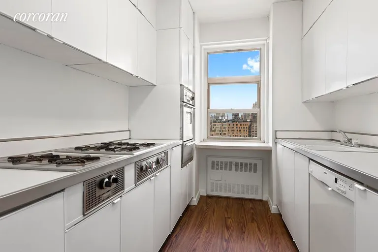 New York City Real Estate | View 150 East 69th Street, 16G | Windowed kitchen | View 5