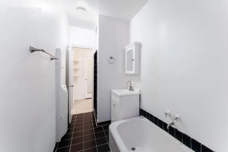 New York City Real Estate | View 230 Park Place, 5D | Large Bathroom with Tub and shower | View 7