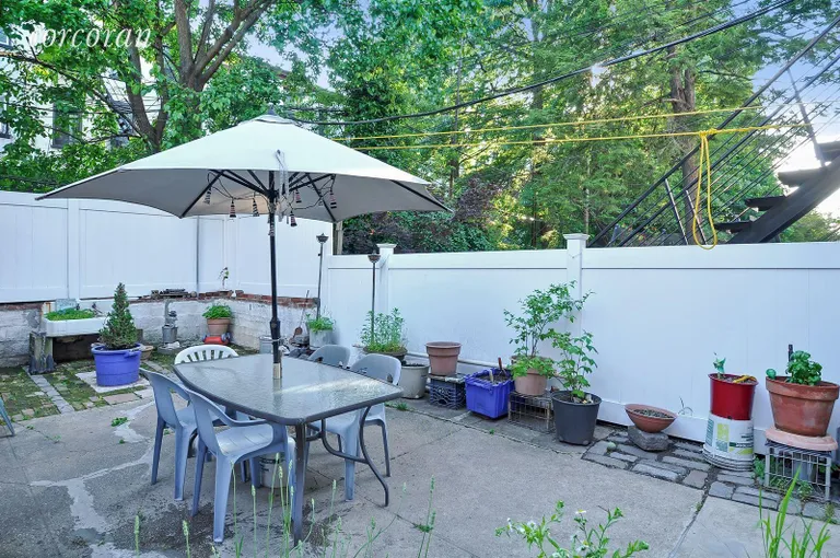 New York City Real Estate | View 308 11th Street | Spacious Backyard Ready for BBQs and Summer Fun! | View 4