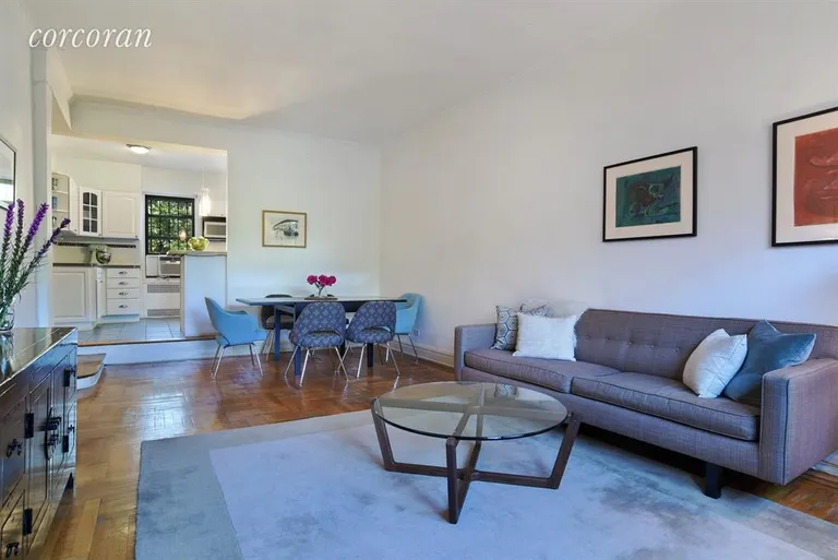 New York City Real Estate | View 230 Park Place, 6N | Top Floor Living Room With Tree Top Views | View 2