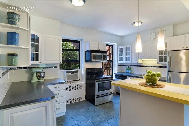 New York City Real Estate | View 230 Park Place, 6N | Windowed Kitchen With Center Counter | View 4