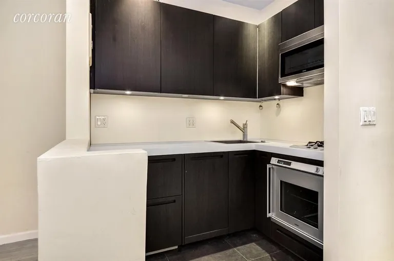 New York City Real Estate | View 186 West 80th Street, 4E | modern Kitchen with dishwasher | View 2