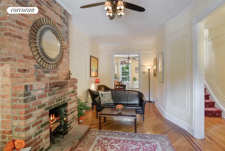 New York City Real Estate | View 514 6th Avenue |  Parlor Living Room with Exposed Brick Fire-place | View 2