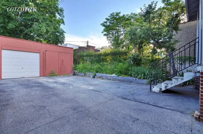 New York City Real Estate | View 1022 East 228th Street | Side Yard | View 7
