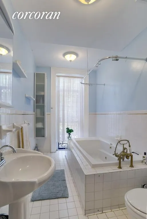 New York City Real Estate | View 54 S Portland Avenue | Bathroom with Tub and Shower | View 8