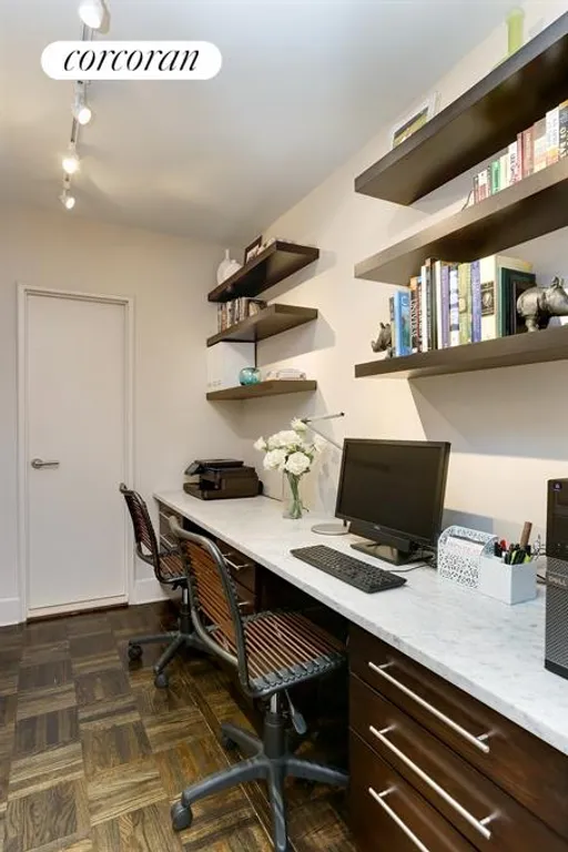 New York City Real Estate | View 400 East 56th Street, 26E | Home Office with Built In Desk and Shelving | View 5
