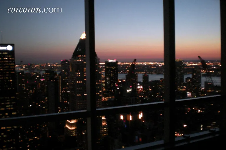 New York City Real Estate | View 230 West 56th Street, 66B | Southern View from Master bedroom | View 10