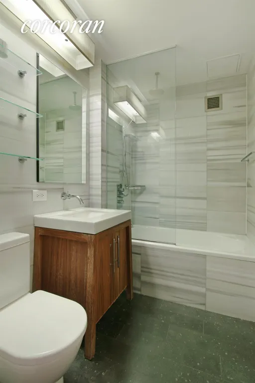 New York City Real Estate | View 88 Greenwich Street, 1316 | Renovated bathroom | View 4