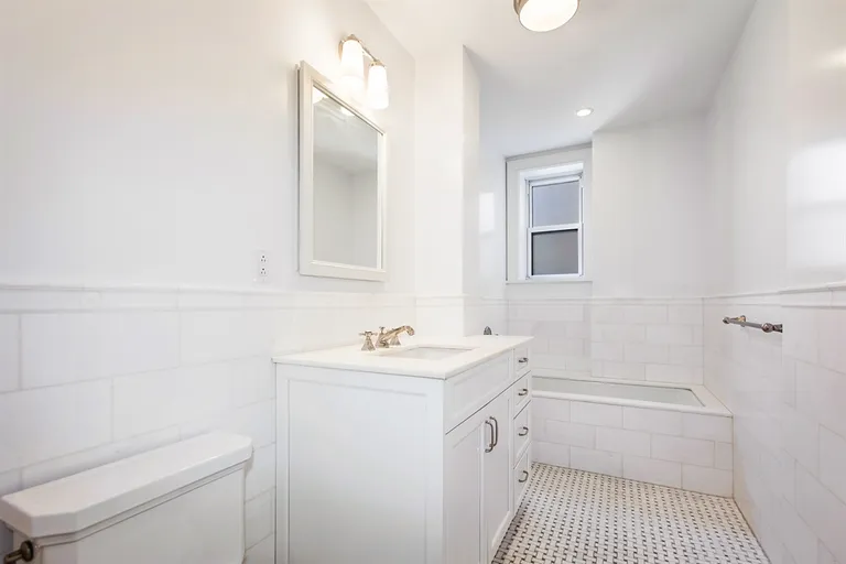 New York City Real Estate | View 215 West 88th Street, 8H | Large bathroom has shower stall and bath tub | View 7