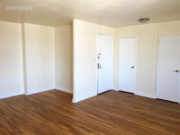 New York City Real Estate | View 131 Beach 119th Street, 4G | Double width living room  | View 3
