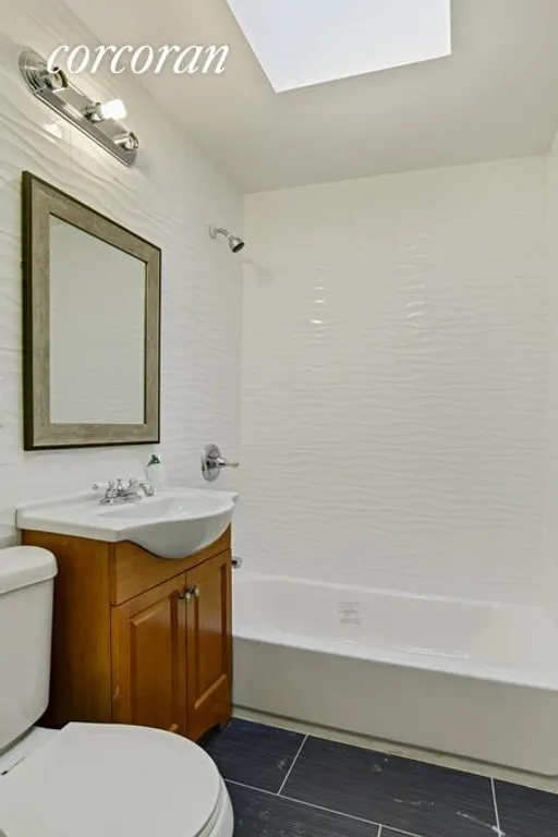 New York City Real Estate | View 151 Rogers Avenue, 2 | Bathroom W/ Skylight | View 5