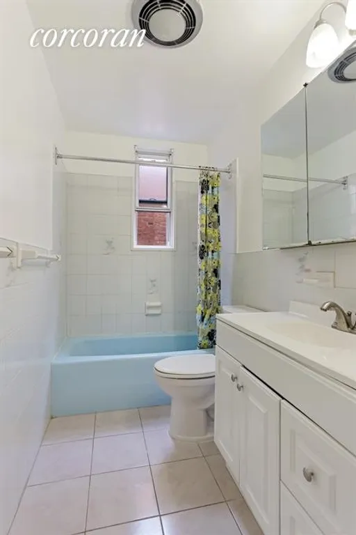New York City Real Estate | View 59 Sterling Street | Windowed Bathroom | View 9