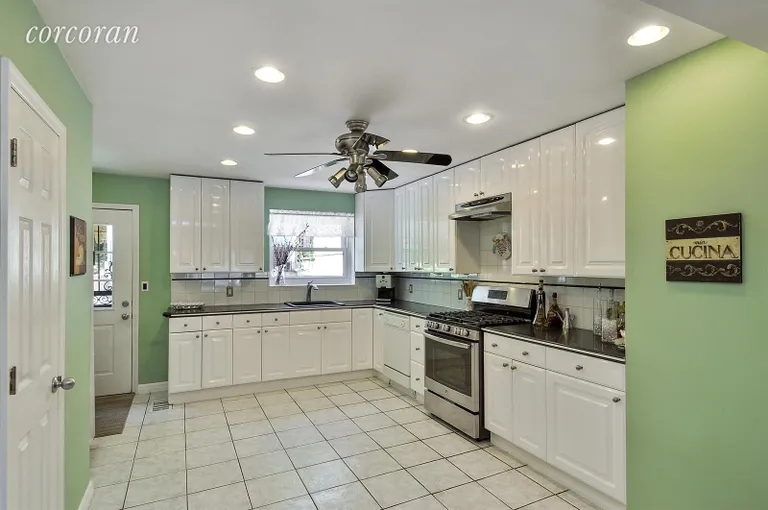 New York City Real Estate | View 639 Vanderbilt Street | Recently Renovated Kitchen leads to the Backyard | View 3