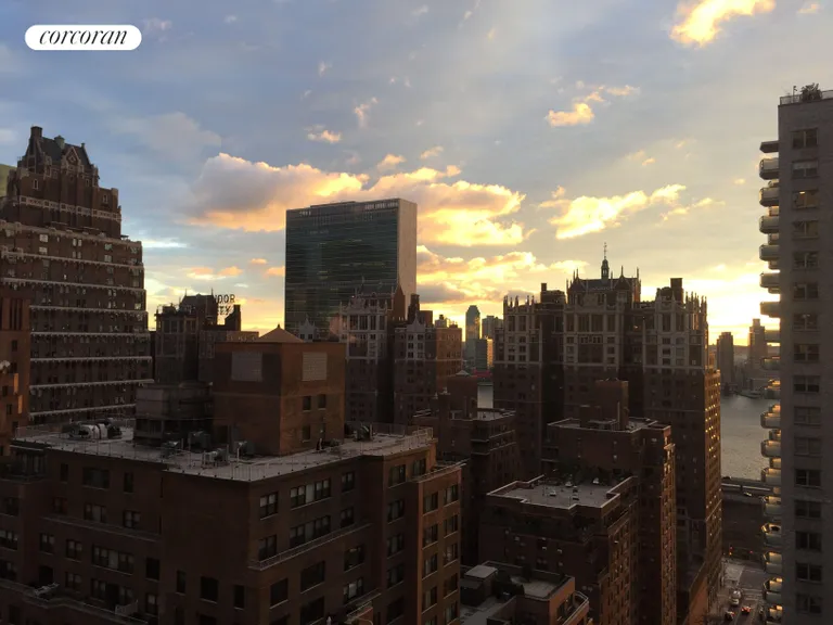 New York City Real Estate | View 250 East 40th Street, 26E | Morning Sunrise East View from Balcony | View 7