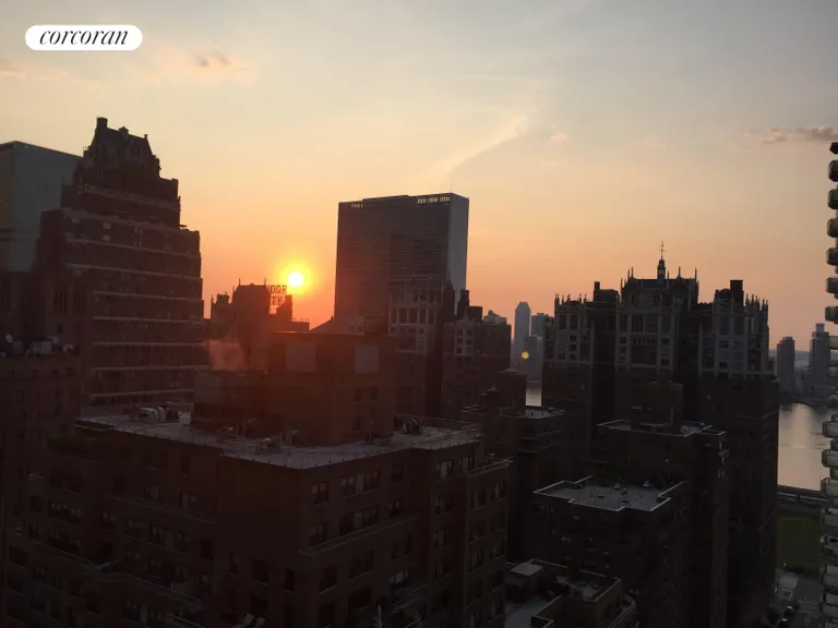 New York City Real Estate | View 250 East 40th Street, 26E | Morning Sunrise East View from Balcony | View 6