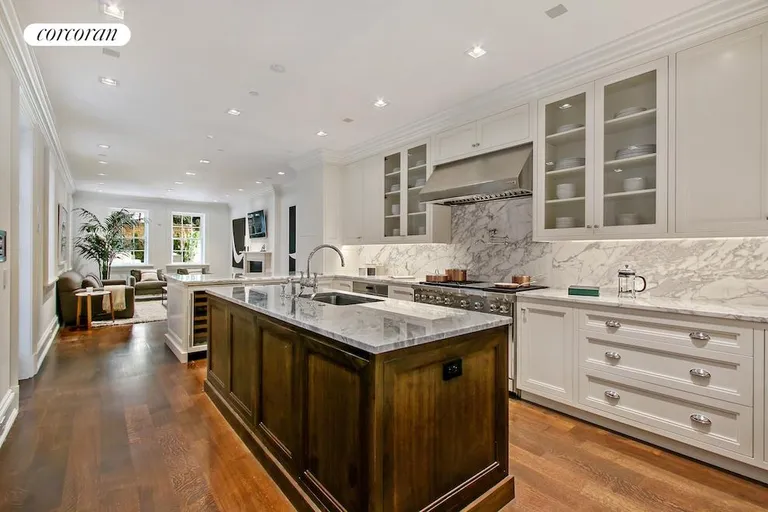 New York City Real Estate | View 27 Monroe Place | Kitchen with family room beyond | View 6