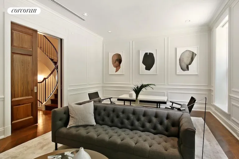 New York City Real Estate | View 27 Monroe Place | Living room looking out to center hall and stairs | View 10