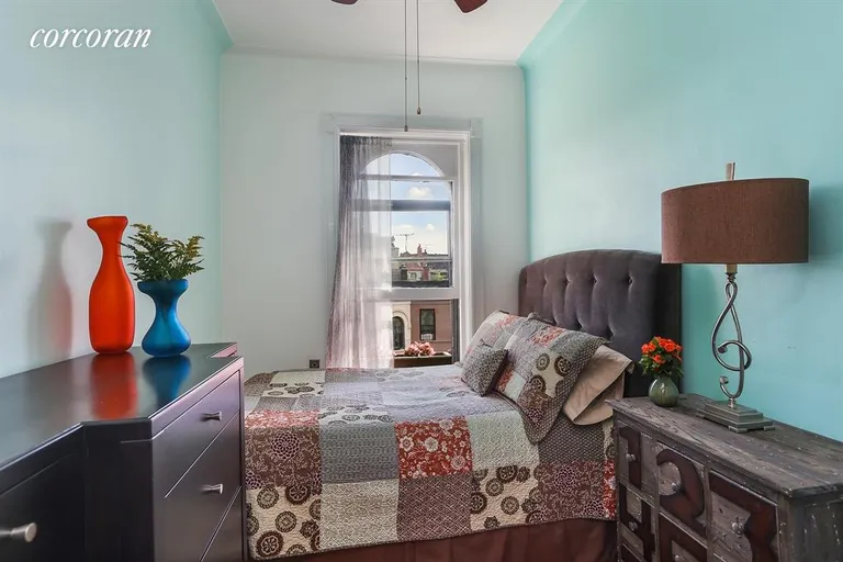 New York City Real Estate | View 296 Garfield Place, 4F | Cozy bedroom with skyline view. | View 3